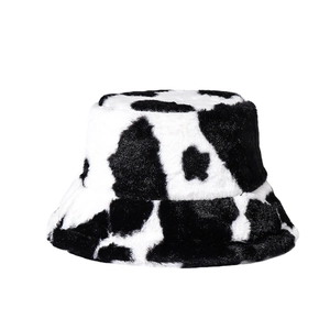 Faux rabbit fur bucket hat with black and white cow print for autumn and winter fashion