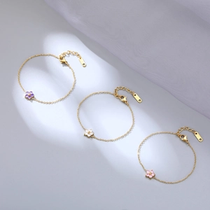 Elegant gold flower bracelets with purple, white and pink floral charms for women