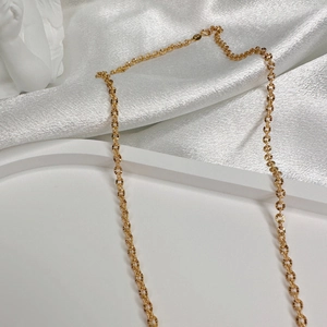Detailed close-up of S925 sterling silver gold-plated O-chain with fine circular links