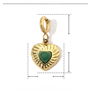 Detail view of 16mm x 8mm heart-shaped golden stainless steel charm with green stone