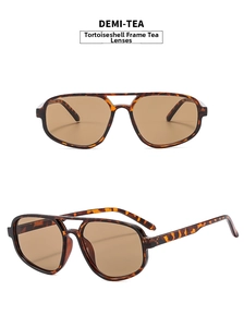 Detail view of double bridge pilot sunglasses with demi frames and tea lenses