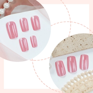 Sparkling pink cat-eye press-on nails set with creative circular display and pearl decor