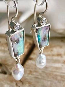 Elegant opal and baroque pearl drop earrings with iridescent trapezoid stone inlay