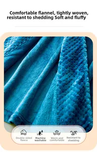 Macro detail of blue flannel fabric texture with double-sided fleece and embossed dots