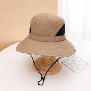 Detail of khaki outdoor sun hat featuring breathable black mesh and adjustable chin strap