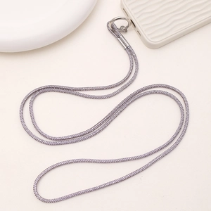 Detail of lavender rhinestone crossbody phone strap with metallic ring connector