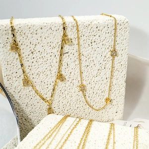 Elegant gold stainless steel necklace and bracelet set with square zircon pendants