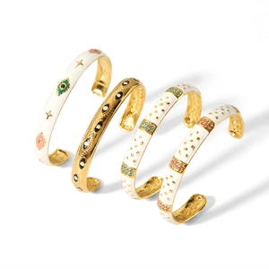 Set of four 18K gold plated stainless steel enamel bangles with evil eye and star designs