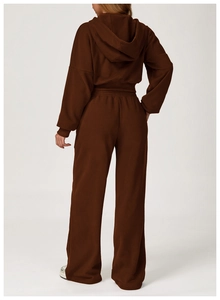 Detail view of high waist dark brown wide leg sweatpants with premium ribbed cuffs