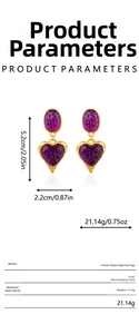 Detail view of oval heart drop earrings showing dimensions 5.2cm height and 2.2cm width