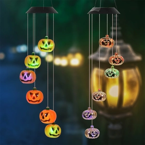 Solar powered Halloween pumpkin wind chime with six glowing lanterns for outdoor decor