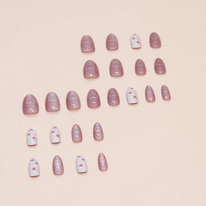 Cat eye press-on nails set with strawberry designs and hearts in short oval shape