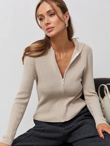 Slim fit cream ribbed knit hoodie with metal zipper closure for a minimalist casual look