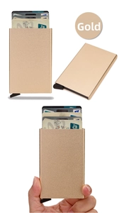 Detail of champagne gold RFID aluminum card holder with one-click pop-up mechanism