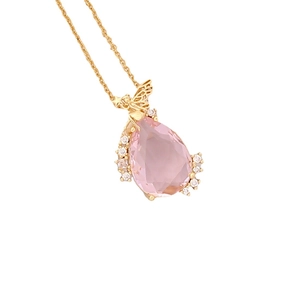 Pink pear-shaped gemstone necklace with golden bee motif on a delicate chain