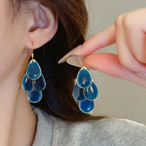 Three-tier dark blue water drop tassel earrings with gold-tone metal trim for women