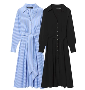 Detailed view of striped and black shirt dresses with button front and adjustable waist belts