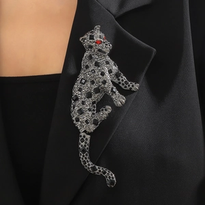Sparkling leopard brooch with rhinestones on black suit lapel for men and women