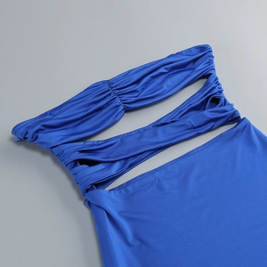 Detail view of royal blue ruched dress with cut-out design and side invisible zipper
