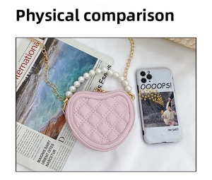 Detailed overhead view of a heart-shaped pink quilted bag with pearl handle and gold chain