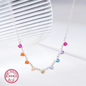 Macro detail of S925 sterling silver chain with vibrant colorful zircon gemstones