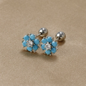 Detailed shot of sky blue flower stud earrings with S925 silver needle and screw back