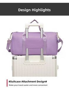 Detail of the luggage trolley strap on a purple fitness travel bag with gold hardware