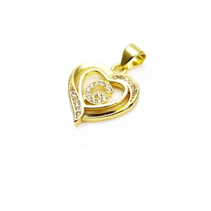 Detail of a gold heart-shaped pendant with cubic zirconia and the letter C