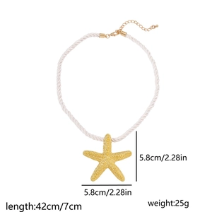 Detail showing gold starfish pendant dimensions with white woven cord necklace measurements