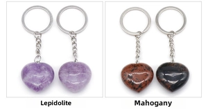 Detail view of heart-shaped Lepidolite and Mahogany Obsidian stone keychains