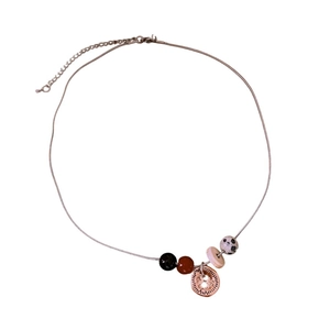 Bohemian titanium steel necklace with spotted stone pendant and sunburst charm