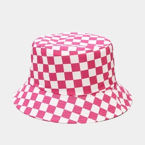 Close-up of pink and white checkered bucket hat with durable cotton fabric texture