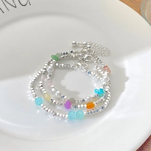 Three-piece set of silver beads, pearls, and colorful crystals bracelets with lobster clasp