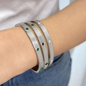 Three silver fish-scale texture bracelets with green black and white zircon stones
