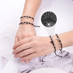 Bracelet tressé ajustable avec projection Je t'aime en 100 langues pour couples