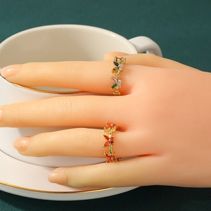 Elegant gold butterfly rings with colorful zircon inlay worn on hand for women