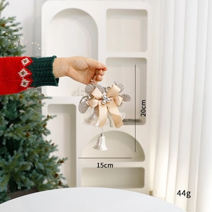 Champagne gold Christmas bell ornament with fabric bow and sequins for tree decoration