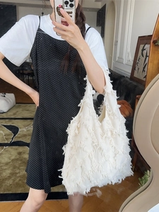 White fringe canvas tote bag for women featuring a large capacity tassel design