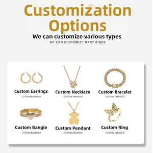 Collection of gold titanium steel jewelry including heart bracelet and bear necklace
