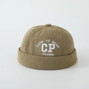 Detailed view of khaki knit brimless beanie with white letter embroidery for boys
