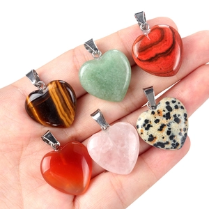 Natural heart crystal pendants in 20mm mixed stones held in hand with metal clasps