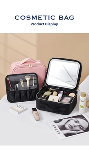 Close-up of makeup case with built-in LED mirror and adjustable dividers inside