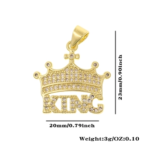 Detail view of a gold-toned KING crown pendant with clear zircons and dimensions 20x23mm