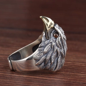 Vintage eagle head ring for men with silver feathers, golden beak and red eye details