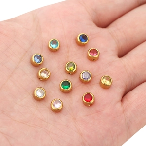 6mm gold-plated stainless steel beads with colorful zircon stones held in palm