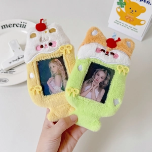 Detail of yellow and green plush photocard holders in cute cartoon drink cup shapes