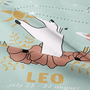 Detail of bohemian Leo zodiac tapestry with hand illustration and woven texture