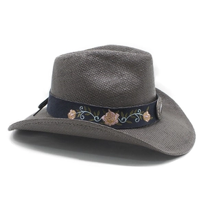 Detail of dark gray straw cowboy hat with embroidered rose band and vintage metal buckle