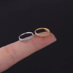 Silver and gold stainless steel hoop rings with small beads and clear cubic zirconia stones