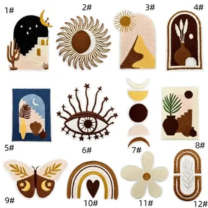 Set of 12 Bohemian embroidered patches featuring celestial sun, moon, and butterfly designs